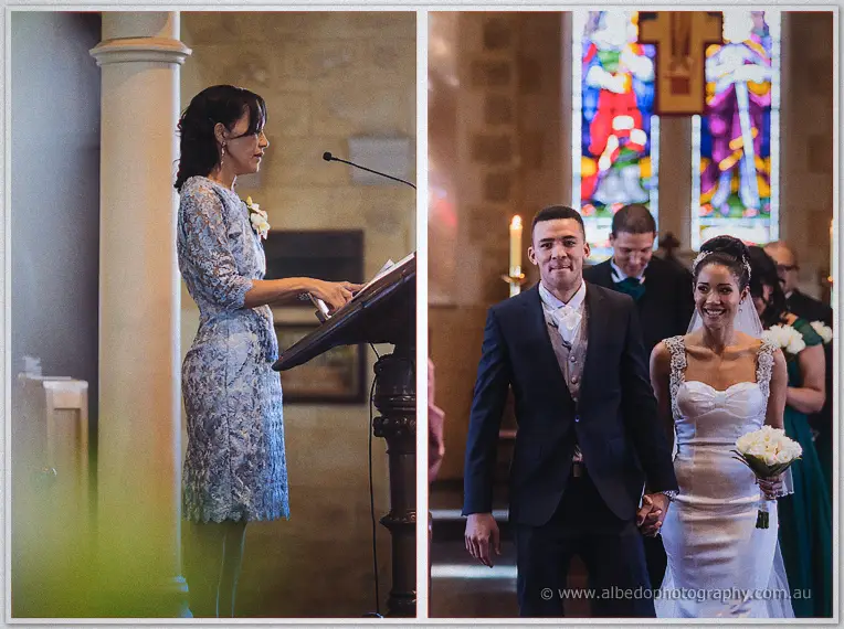 A reader speaks at the wooden lectern, then the beaming couple walk hand in hand back down the aisle.