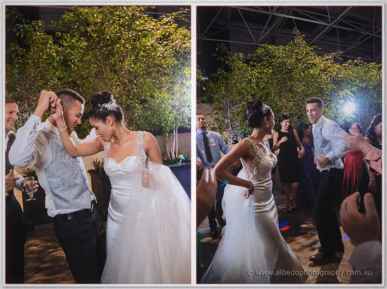 Cristal dances with her celebratory groom in a silver vest as guests clap around the floor