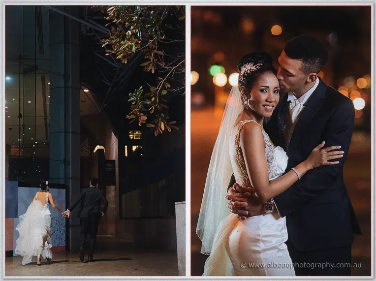 Cristal leads Troy down a dark city laneway, then Troy kisses her cheek against warm bokeh lights