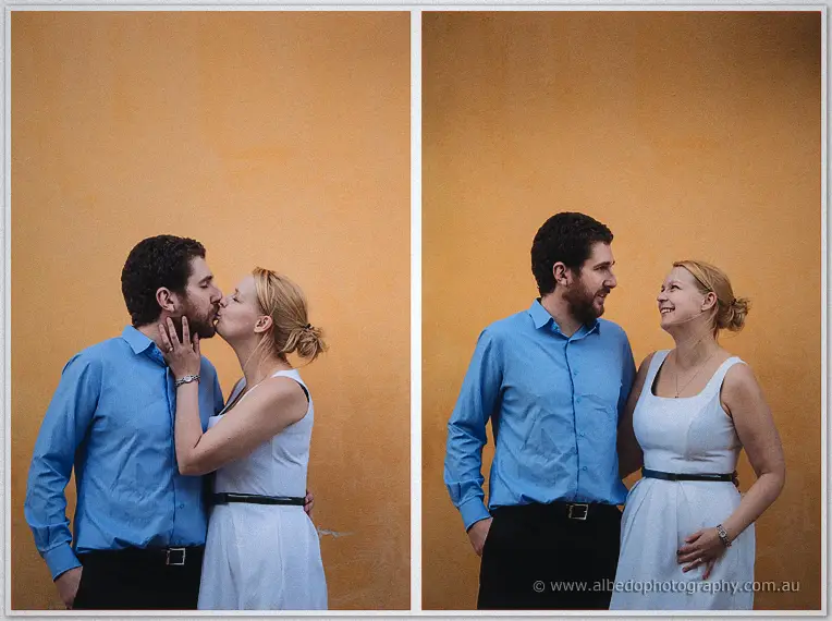 Two frames against an orange wall: Julie kisses Dale, then the pair share a smile