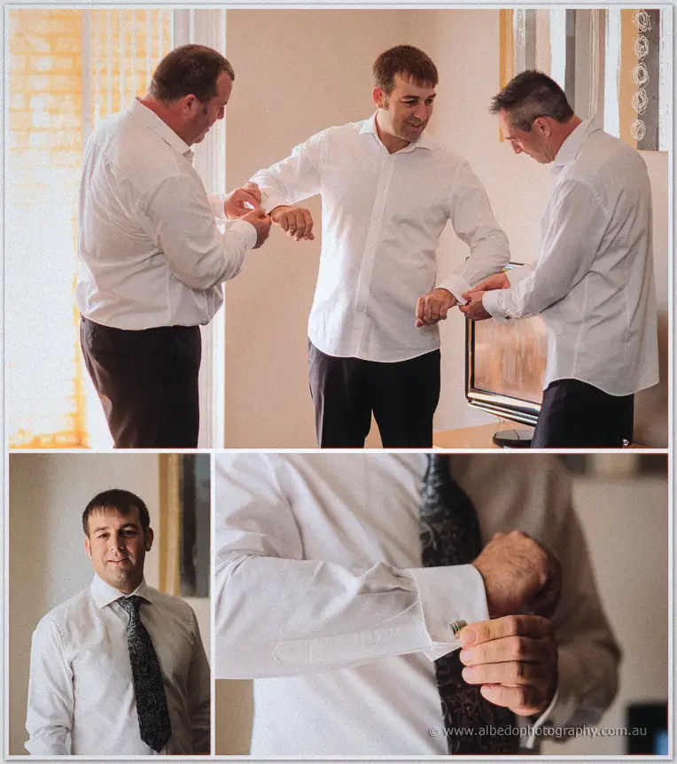 Groomsmen help Max with his cufflinks and collar in soft morning light before the Hillarys ceremony.