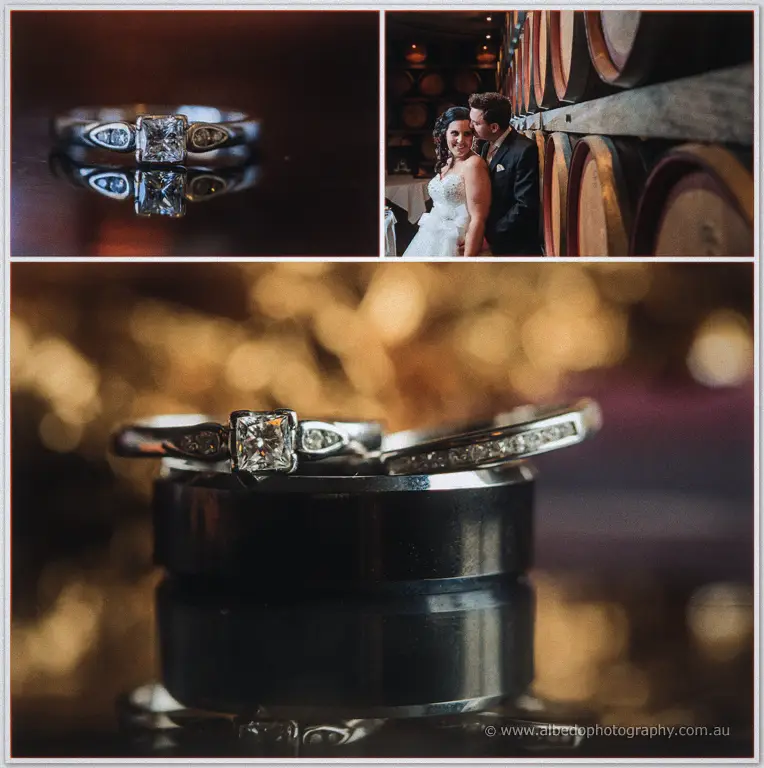 Macro of Sarah's diamond solitaire and Chris's band on a wine cask, barrel-room couple portrait inset.