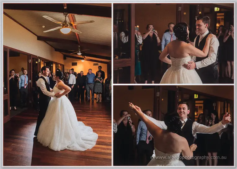 Sarah and Chris share their first dance on the timber floor as guests circle with phones and cameras.