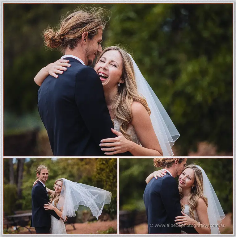 Tara throws her arms around Stephen's neck, laughing as her veil catches the breeze