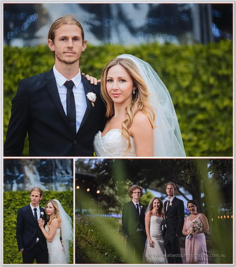 Tara rests her hand on Stephen's chest in front of the hedged garden wall