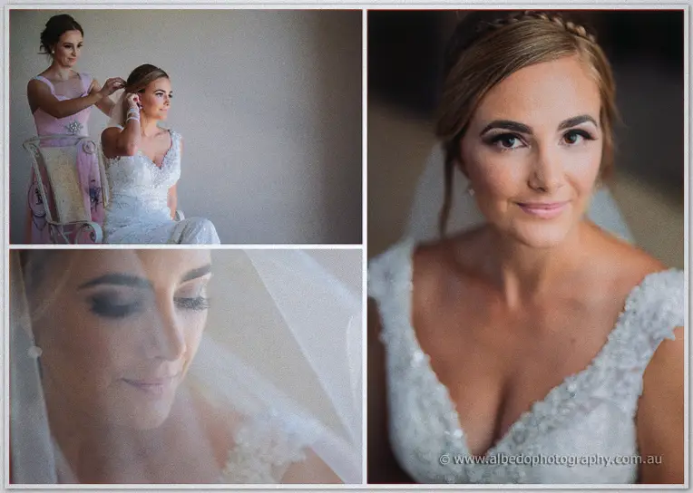Tarmecca's bridesmaid lowers her veil as the bride gazes down serenely, eyes soft beneath the tulle.