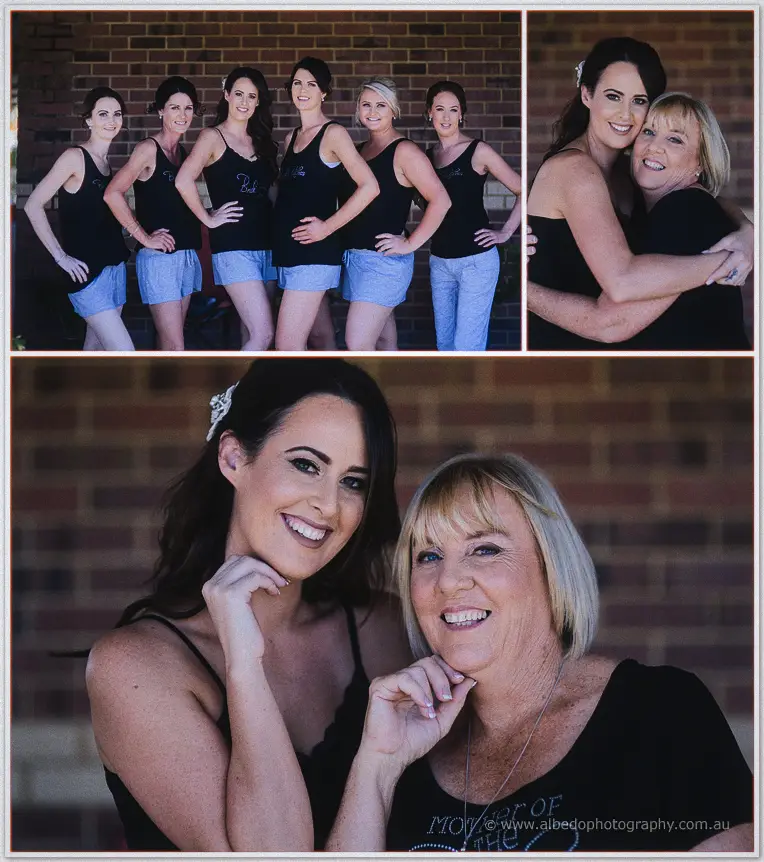 Prue and her bridesmaids in matching black singlets and shorts against a brick wall