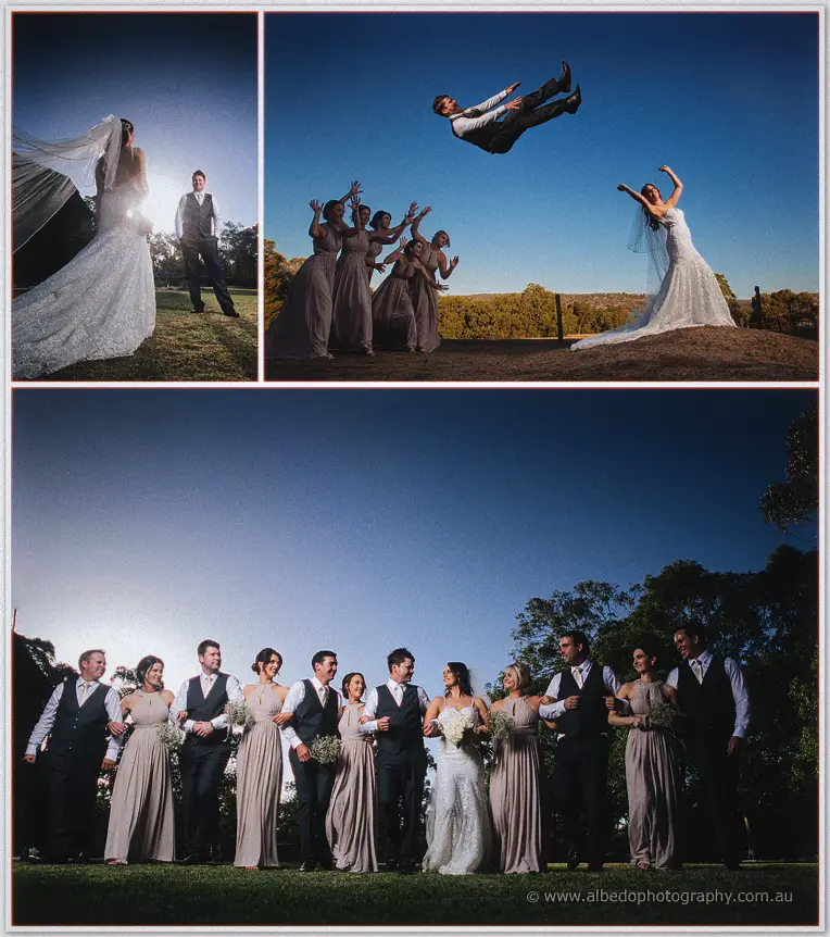 Groomsmen tossing a groomsman skyward as Prue cheers with bridesmaids under a blue sky