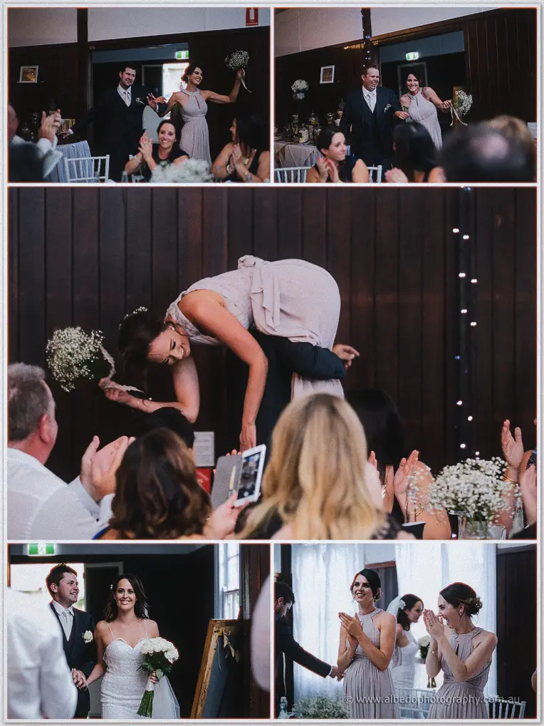 Bridesmaids and groomsmen bursting into the Fairbridge hall to cheering seated guests