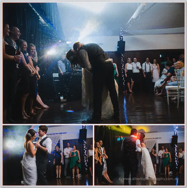 Prue and Michael sharing their first dance under disco lights and drifting bubbles