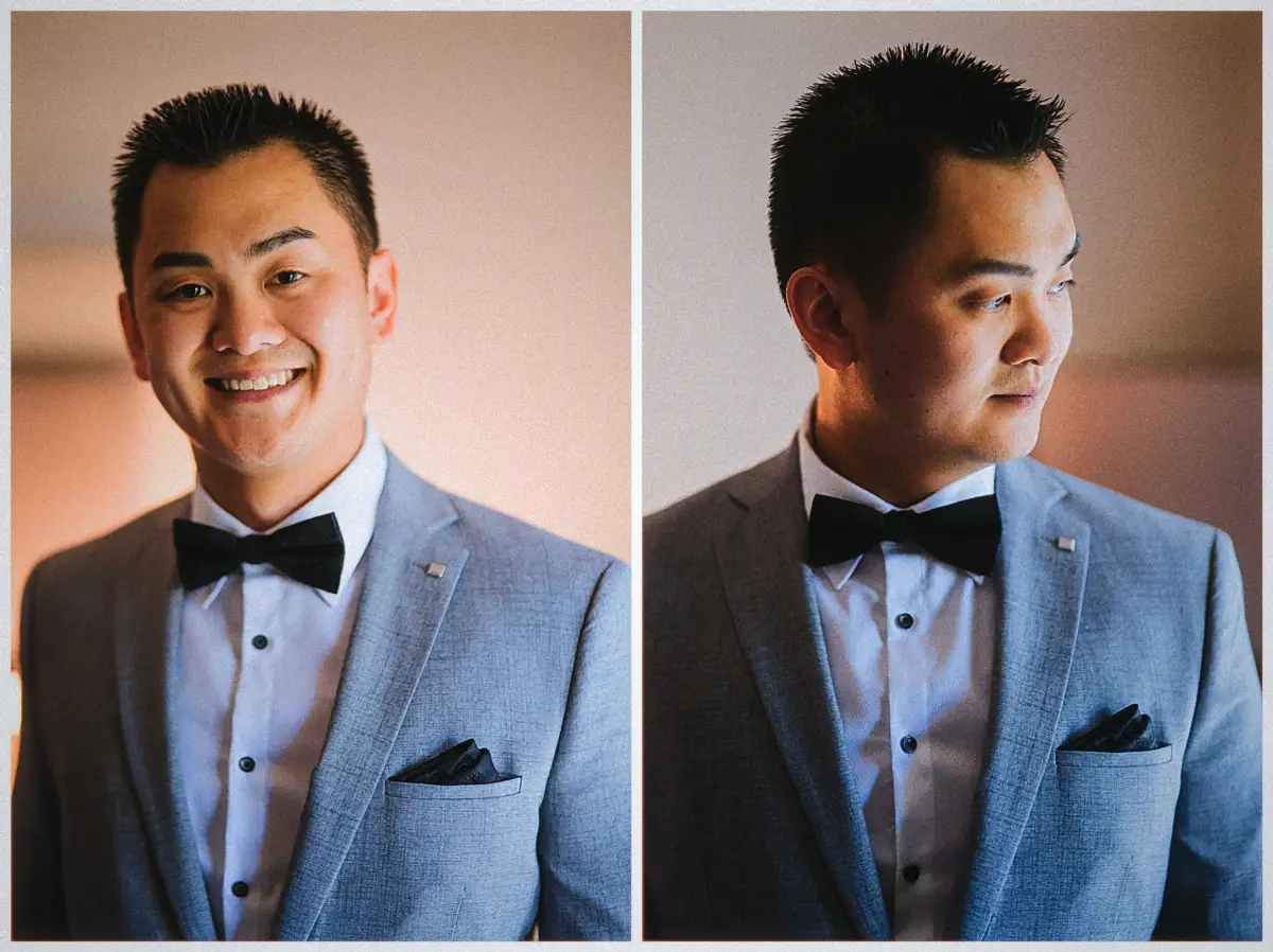Portrait pair of Andrew in his grey suit and black bow tie smiling at the camera