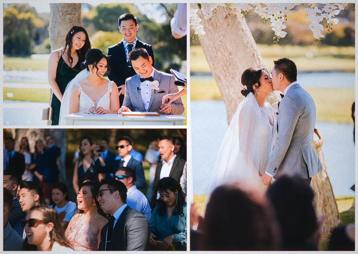 Andrew kisses his bride beneath white orchids by the lake during their Joondalup Resort ceremony