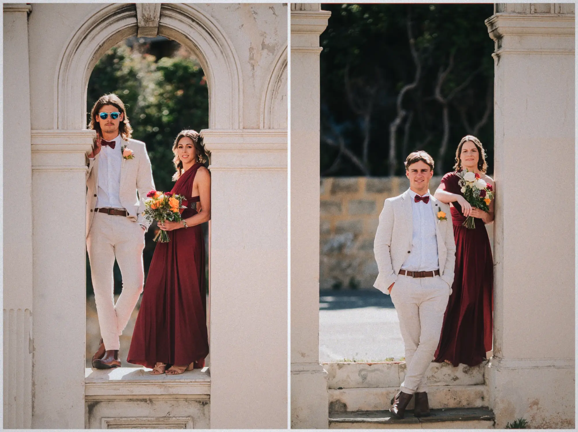 Groomsmen in cream suits posing with burgundy-gown bridesmaids holding orange bouquets in stone arches.