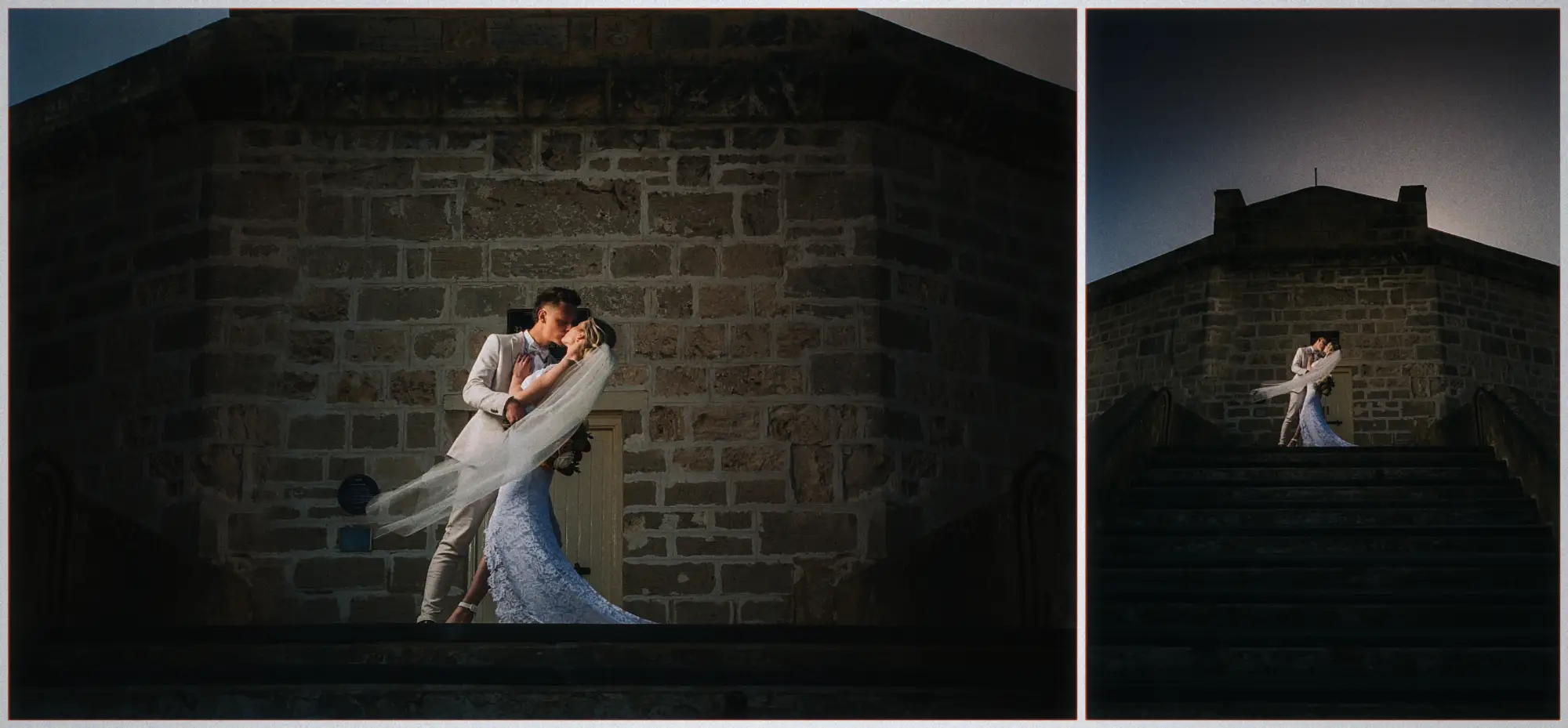 The couple kiss on a stair landing before the old stone Round House in fading light.