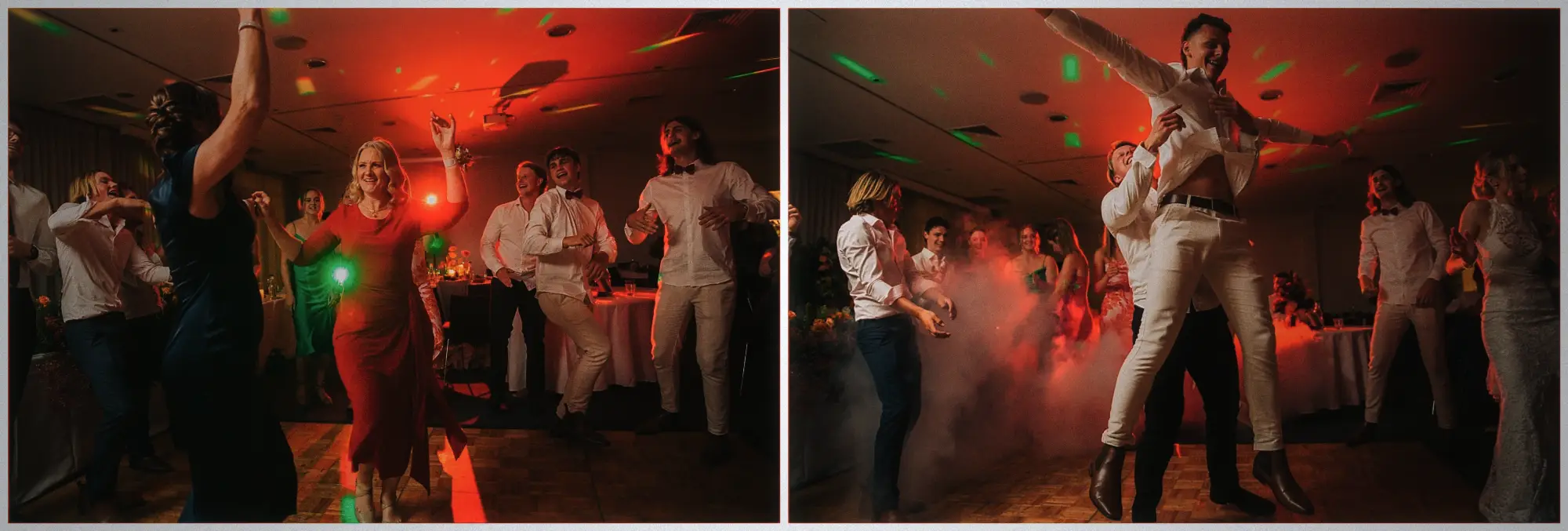 Woman in a red dress dancing with arms raised as a groomsman lifts a friend through the fog