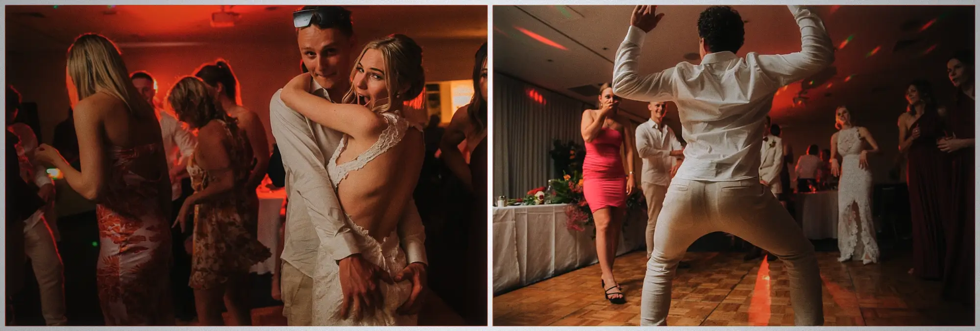 Bride Erin laughing in her backless lace gown as she hugs a guest during the lively reception